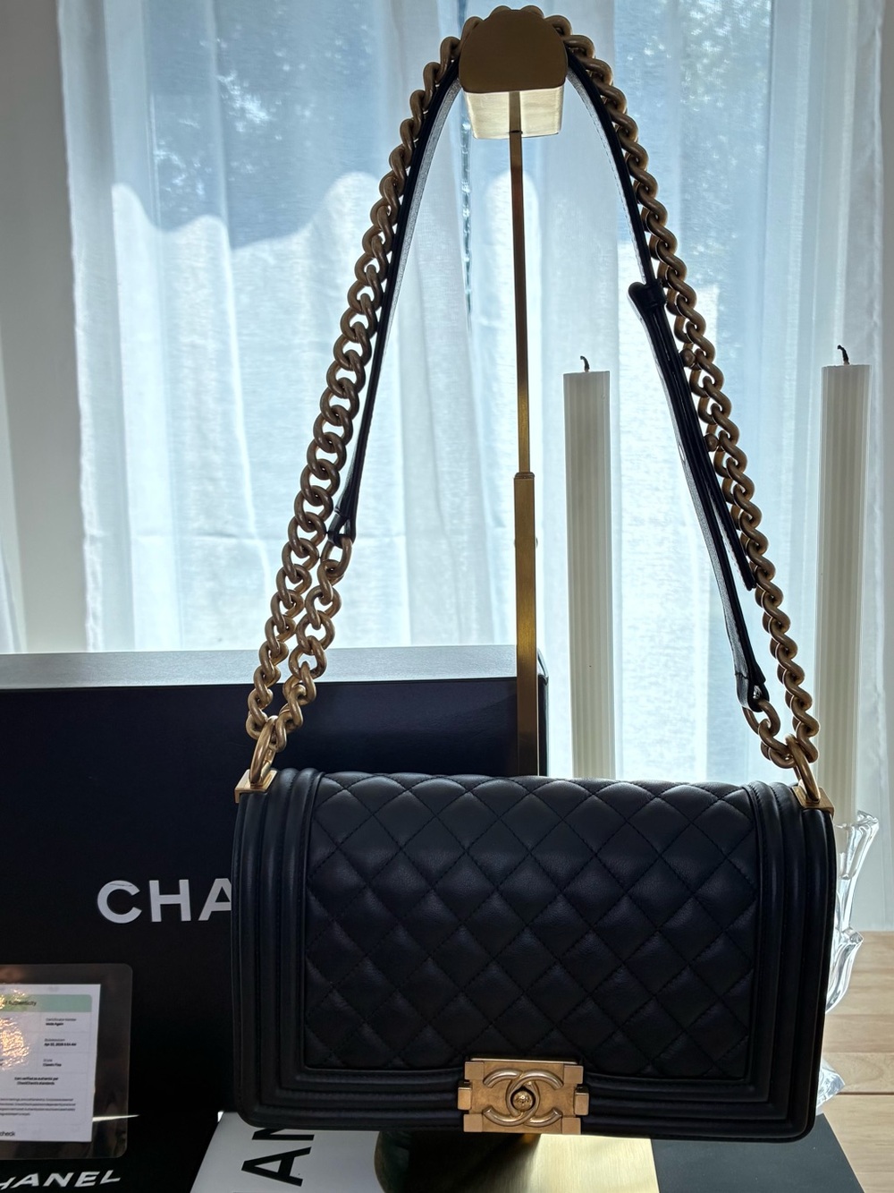 CHANEL Black Quilted Boy Bag with Gold-Tone Chain